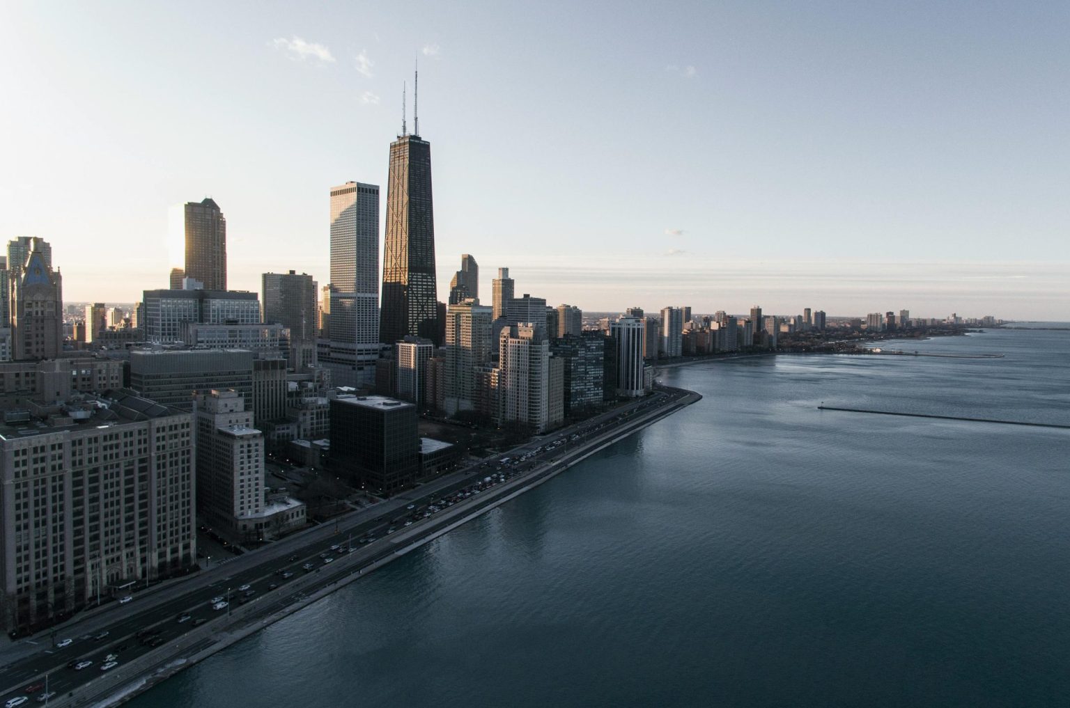 Stunning aerial view of Chicago's skyline during dusk with a waterfront view.